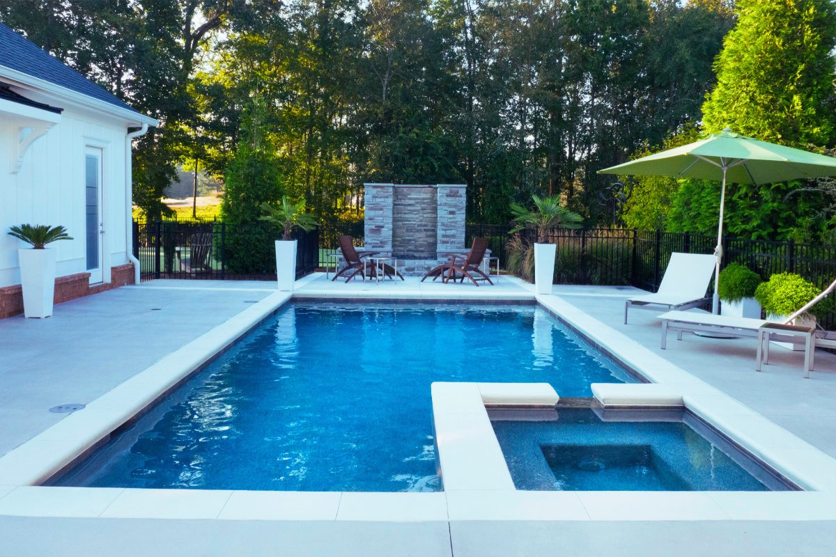 Grey concrete pool surround poured and finished